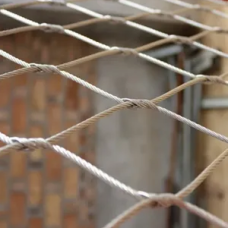 Сетка нержавеющая тросовая с параллельным узловым креплением и ромбической ячейкой Н8 7х7 AISI 316 20х35х1 мм